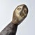 A hand-carved Lega figure originates from the Lega people in the Democratic Republic of the Congo. The figure is easily...