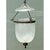 This bell jar lantern pairs faceted crystal with aged metalwork in a form long associated with grand colonial-era...