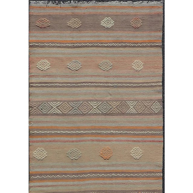 Measures: 3'4 x 11'0 Vintage Turkish Flat-Weave Kilim in Muted Colors with Stripes and Embroideries. Keivan Woven Arts:...