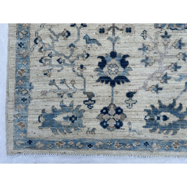 Oushak Handmade Wool Rug With Blue and Ivory Floral Design For Sale - Image 12 of 12
