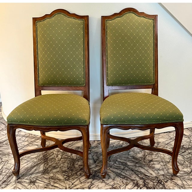 Pair of Ethan Allen fully upholstered chairs in green with Brunschwig & Fils accent fabric on the back. The chairs make...