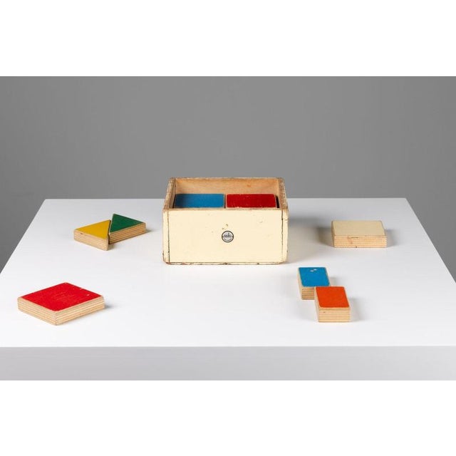 A beautifully preserved ado ‘kistje gekleurde tegels’, model 255, designed by ko verzuu and manufactured by ado in the...