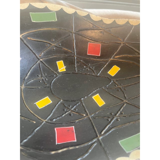 MCM decorative dish, in the organic and uneven Cosenza shape, by Brentleigh Ware. This atomic-style piece, in black with...