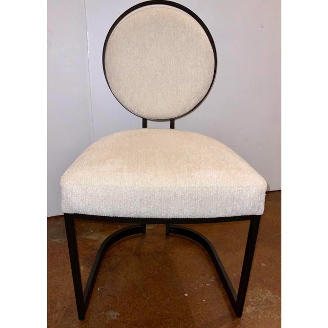 Original retail $1275, stylish Caracole Modern Cream Chenille La Lune Side Chair, black metal frame, oval back, showroom...