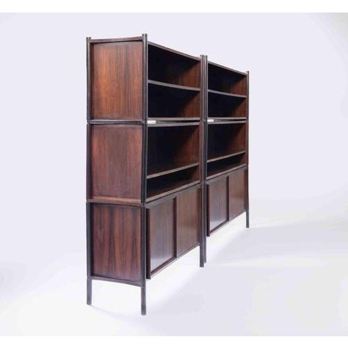 Pair of freestanding rosewood units model "Archimede" realized by Hirozi Fukuoh for Gavina in 1960. Solid and veneered...