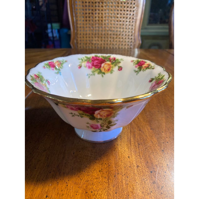 1 Royal Albert China, 6.5” Old Country Roses Footed Bowl, rimmed in 14 karat, gold leaf, no chips or cracks, produced in...