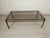 Gold-Plated Bronze Coffee Table with Tinted Glass, 1970s, in Good conditions. Designed 1970 to 1979