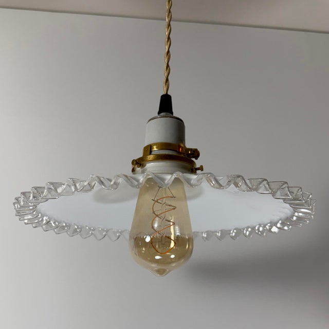 A beautifully hand-blown French white opaline glass pendant light dating to the 1930s. Sourced in Provence, this classic...