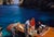 Capri Riva Boat Picnic by Toni Frissell A speedboat prepares for its trip onto the waters of Capri, 1959. (Toni Frissell)...