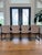 An exceptional set of four Danish Modern dining chairs crafted in Denmark during the height of Scandinavian Modern design....