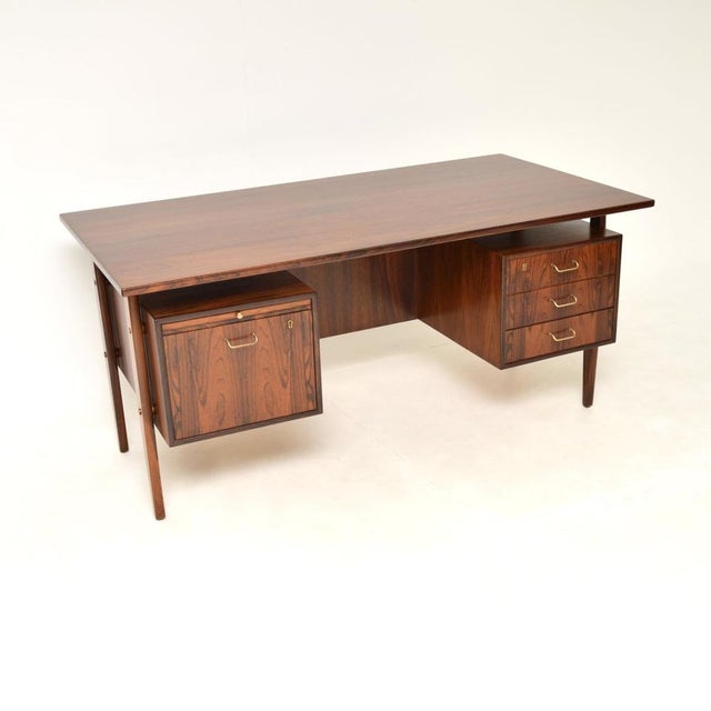 A stunning Danish vintage midcentury desk of the highest order. This was recently imported from Denmark, it dates from the...