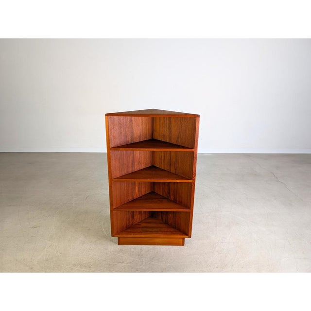 We are offering for sale a beautiful small teak corner shelf from the 1960s and 1970s. The shelf impresses with its simple...