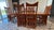 A stunning example of American craftsmanship, this heirloom-quality dining set was meticulously handcrafted by Amish...