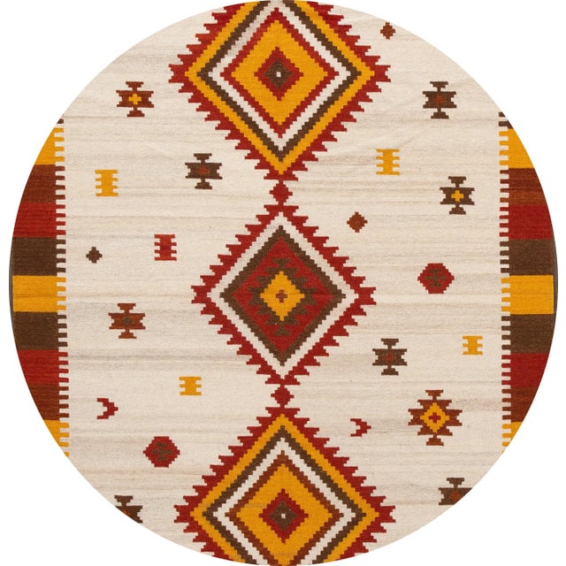 A beautiful hand-woven modern Kilim rug with an ivory field and multi-color accents in an all-over geometric design. This...