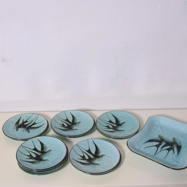 Rare and valuable 12-piece dessert set in French turquoise majolica. It features a deep turquoise background with a relief...