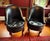 Pair of Maitland-Smith 4330-810 Black Leather Swivel Chairs A striking matching pair of Maitland-Smith Model 4330-810...