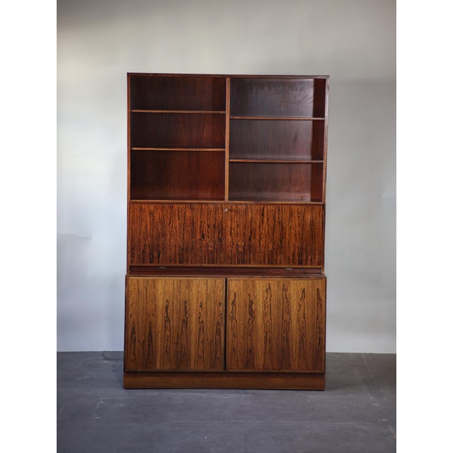 Beautiful and rare tall cabinet, designed by gunni omann for omann jun, denmark, 1960s. This highboard / bookcase is made...