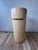 A sophisticated Postmodern cylindrical pedestal or covered vessel clad in cream-colored goatskin and accented with a...
