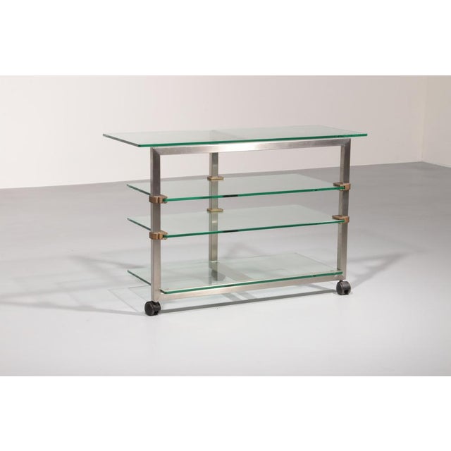 This exceptional Apart side table by Peter Ghyzcy is a striking example of innovative European design from the 1970s....