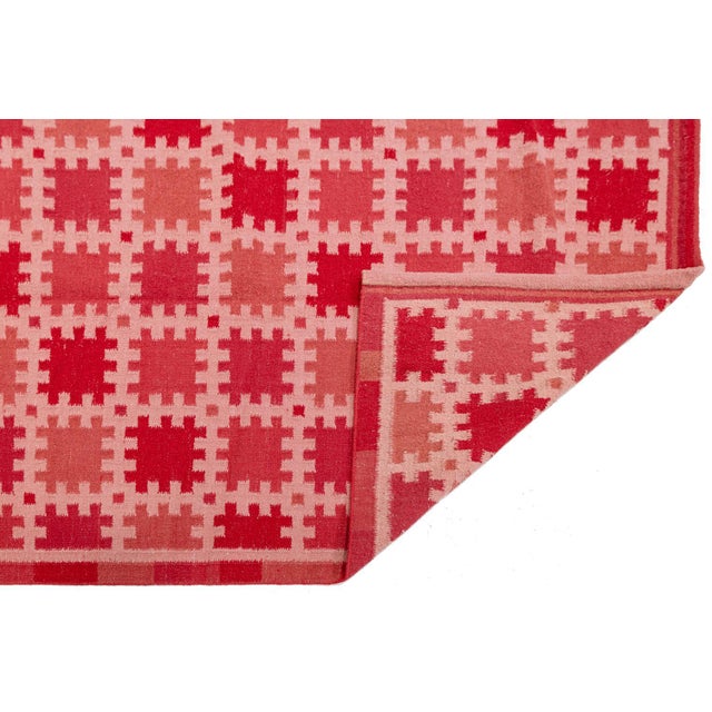 Elevate your space with the minimalist elegance of this Swedish-style flatweave wool rug. Handcrafted with a durable, low-...