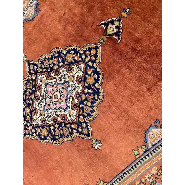 Very beautiful late 20th century rug with a nice design and beautiful colors, entirely and finely hand knotted with wool...