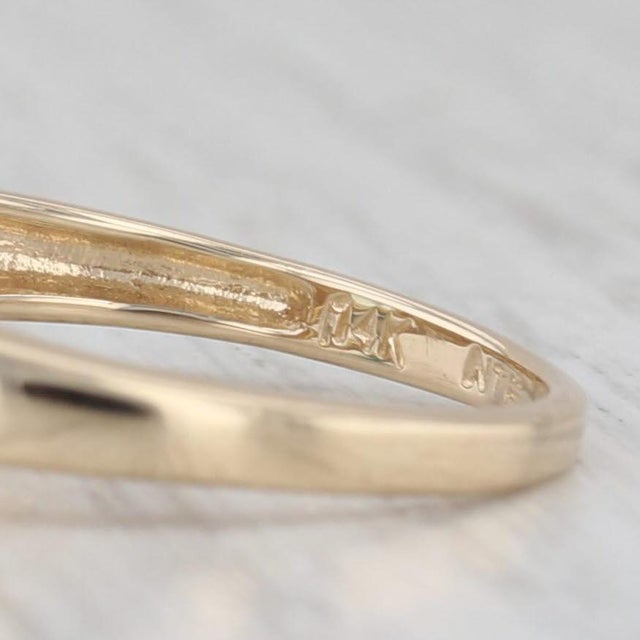 Gemstone Information: - Natural Zircon - Carats - 1.80ct Cut - Oval Brilliant Color - Blue - Natural Diamonds - Total...