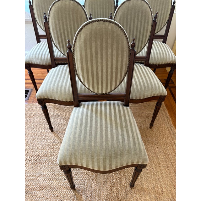 Beautiful chairs from the 1930’s. Gray/Sage green mohair fabric. The wood appears to be walnut. A couple of the finials...