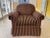 A very nice and well-made rolled arm club chair in burgundy and gold corduroy fabric. Dating from 2002 and retaining the...