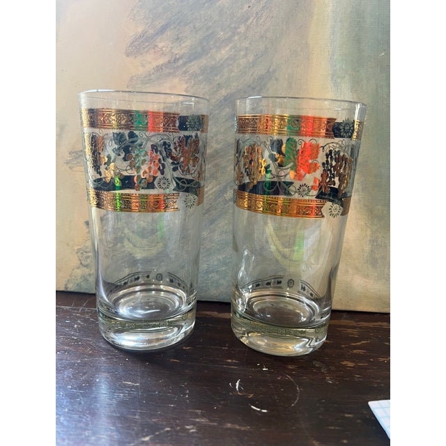 Up for consideration is a beautiful vintage pair of 22kt gold Briard style highball cocktail glasses. These would look...