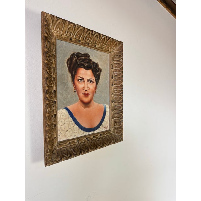 This 1956 vintage portrait by artist Joe Beck captures the confident and direct gaze of a woman rendered with striking...