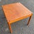 Mid Century Modern Danish Teak Flip Top Side Table. Features square flip top table top with four legs in solid teak.