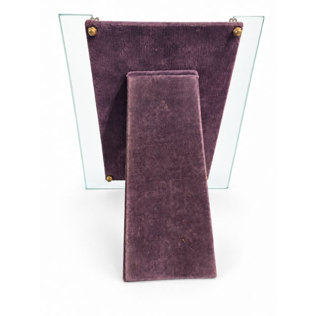 Bring a touch of mid-century elegance to your home with this sweet vintage picture frame from the 1940s or 1950s.This...