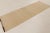 Handwoven in wool, this 3x9 Rez Kilim presents a quiet design of ivory tones enriched by subtle striations and natural...