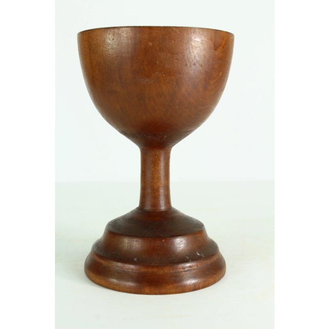 A fine antique goblet/raised cup Hand turned and carved from a single piece of fruit or hard wood With wide shallow bowl...