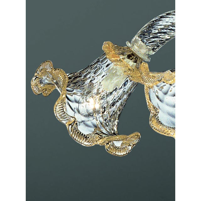 Venetian Floral “Rigadin” Murano Glass Chandelier full of gold Leaf inside. Venetian Romantic transparent and gold Floreal...