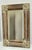 Vintage carved wood textural wall accent mirror with textured flowers on the corners and grooves in the wood pattern...