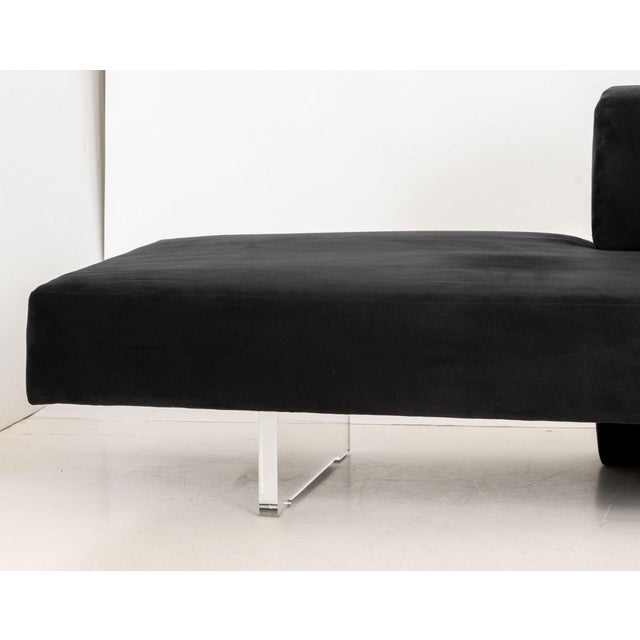 Vladimir Kagan "Omnibus" Black Suede Upholstered Sofa, with lucite base. 28" H x 120" W x 32" D; seat: 17" H. Provenance:...
