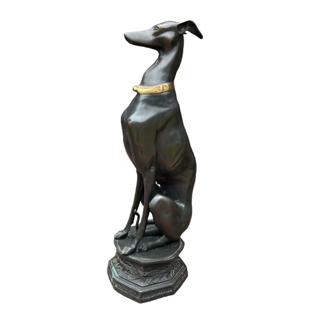 Life size (32" h x 10.5" w x 10.5" d) bronze of a whippet or greyhound seated atop a pedestal. Heavy, highly detailed...