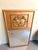 Beautiful vintage French Louis XVI–style trumeau mirror featuring a warm giltwood finish and an impressive raised heraldic...