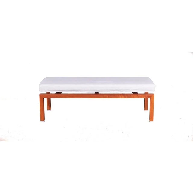 Bench with solid cherry wood structure and seat in white removable fabric. Measures: Height 42cm Width 120cm Depth 42cm