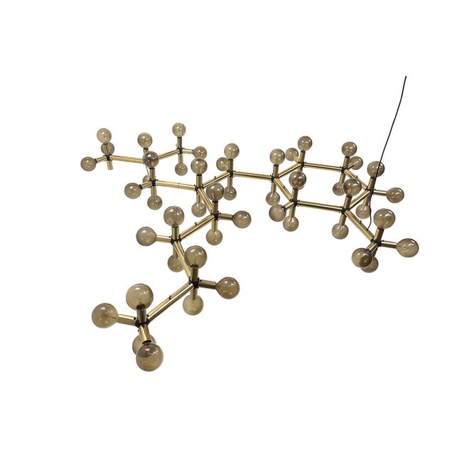 An impressive, original aluminium “Atomic” ceiling lamp designed by Trix and Robert Haussmann in the 1970s, and produced...