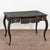 Late 19th-century Swedish pine desk with an old black painted finish that has been distressed over time. The desk features...