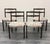 A set of 4 mid-century modern dining chairs in solid wood. The chairs are well made and functional and are upholstered in...