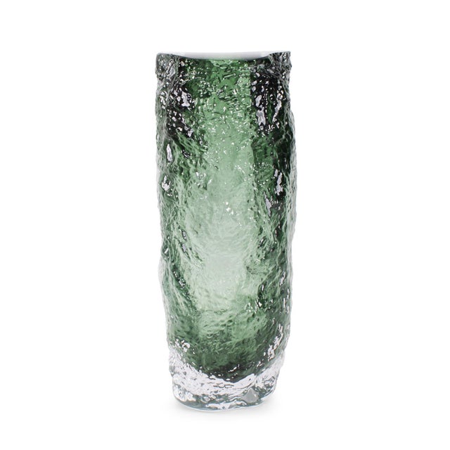 Featuring a sleek design and bright green tones, this piece stands out with its fluid, sculpted shape, making it a...