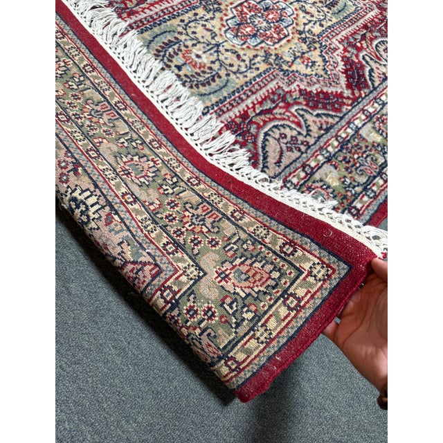 Design Plus Gallery presents a 2ft 11in × 5ft 2in Jewel Tone Red Kashmir Area Rug. The silken rug is a small size and...