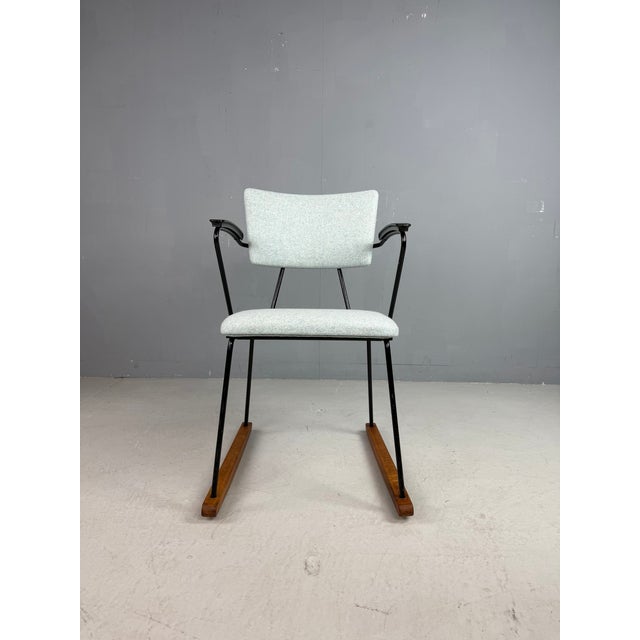 Rocking chair by WH Gispen for Kembo Netherlands. Reupholstered in pastel blue Kvadrat Divina MD 813 and armrests in...