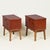 Pair of bedside tables, Denmark, 1940s. Crafted in richly figured stained European yew with a contrasting natural yew...