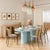 The Elora Lacquer Oval Dining Table is a stunning centerpiece for modern dining spaces, featuring a sleek lacquer finish...