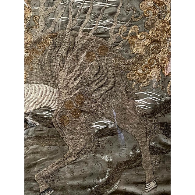 A massive Japanese embordered tapestry professionally displayed in a custom acrylic shadow box. The fine work of textile...