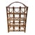 Vintage bamboo and rattan wine rack featuring an arched top, intricate wrapped joints, and sculptural curved bottle...